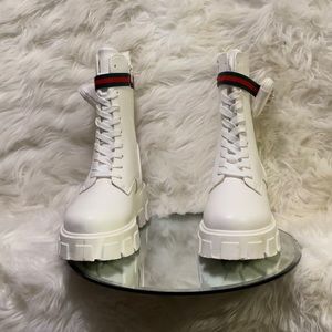 Combat boots both pair